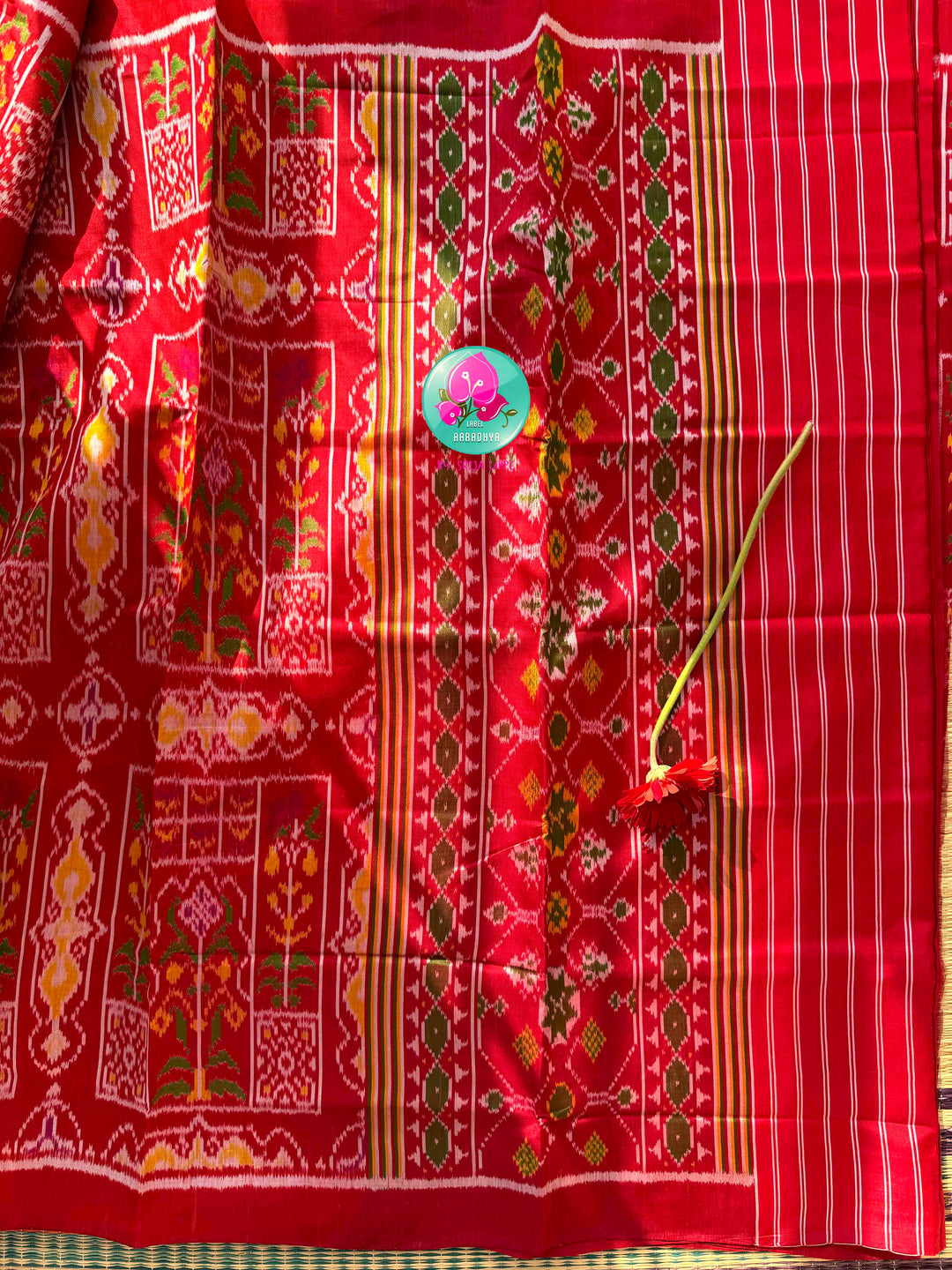 Heirloom Heritage & Regal Valour: 5-Ply Crimson Red Rajkot Patola Silk Saree with Hand-Embroidered Puligoru Emerald Green Raw Silk Blouse