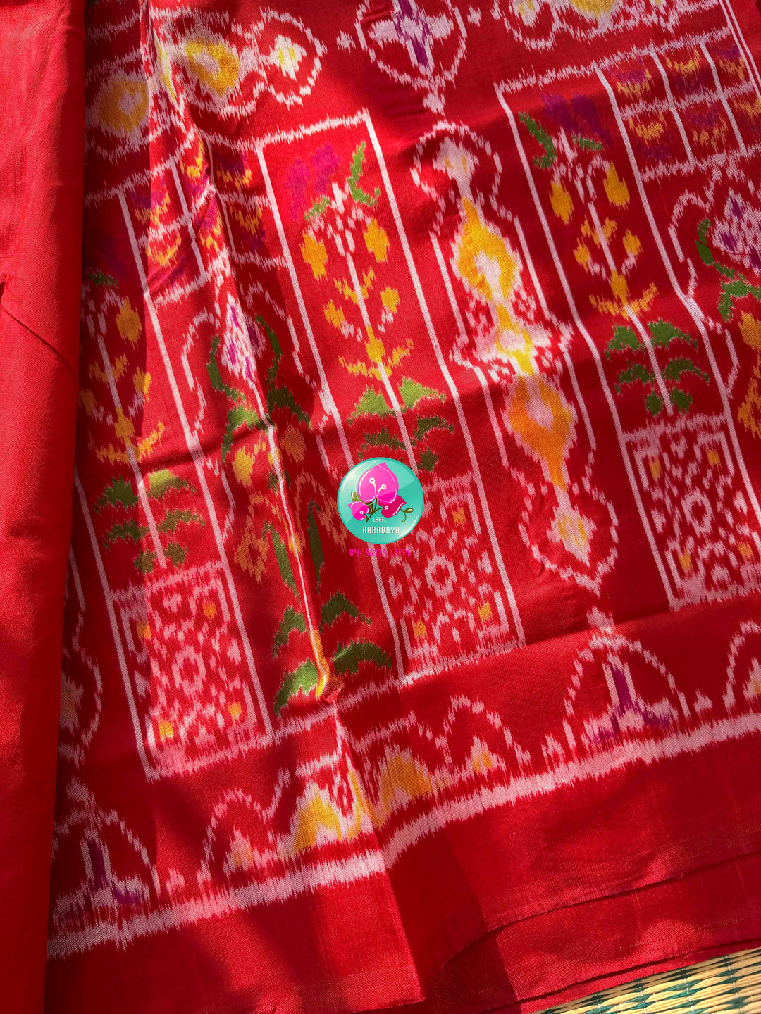 Heirloom Heritage & Regal Valour: 5-Ply Crimson Red Rajkot Patola Silk Saree with Hand-Embroidered Puligoru Emerald Green Raw Silk Blouse