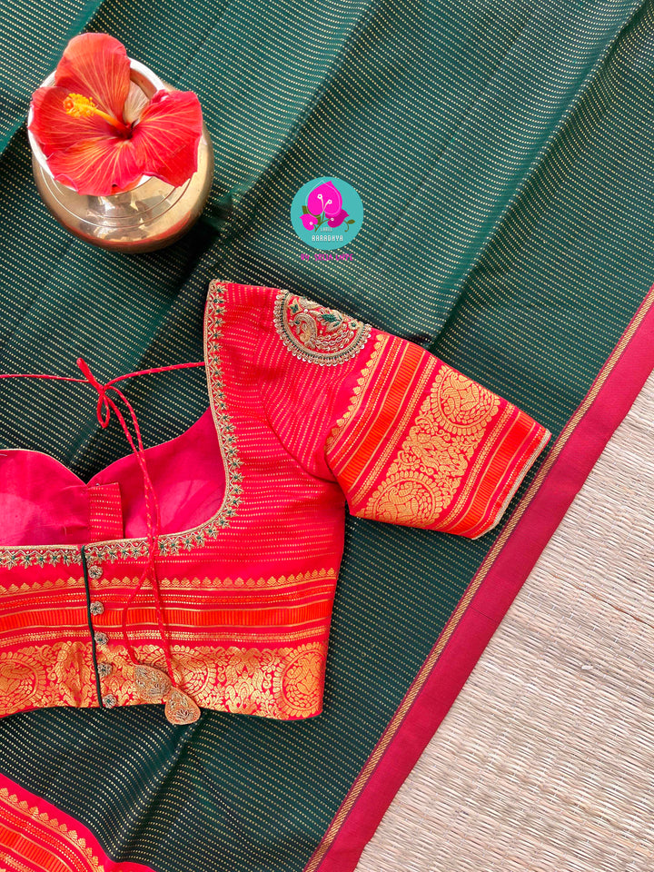 Regal Serenity: Deep Green Kanjivaram saree with Fiery Red Contrast Blouse