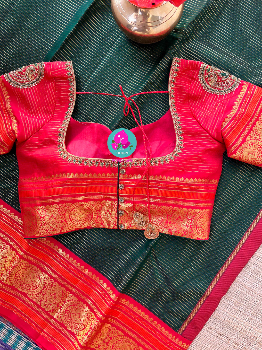 Regal Serenity: Deep Green Kanjivaram saree with Fiery Red Contrast Blouse