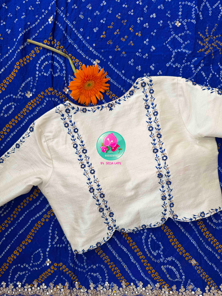 Festive Splendor & Royal Indigo: Pure Georgette Handmade Bandhani Saree with Gota Patti & Hand-Embroidered Off-White Blouse