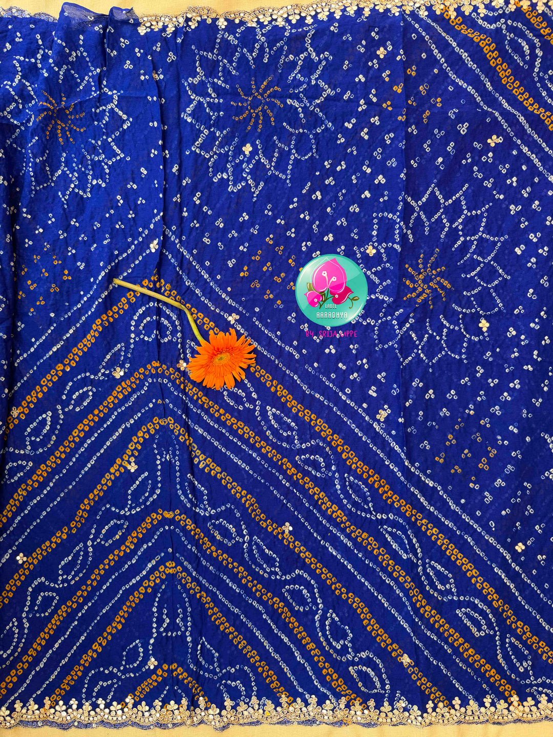 Festive Splendor & Royal Indigo: Pure Georgette Handmade Bandhani Saree with Gota Patti & Hand-Embroidered Off-White Blouse