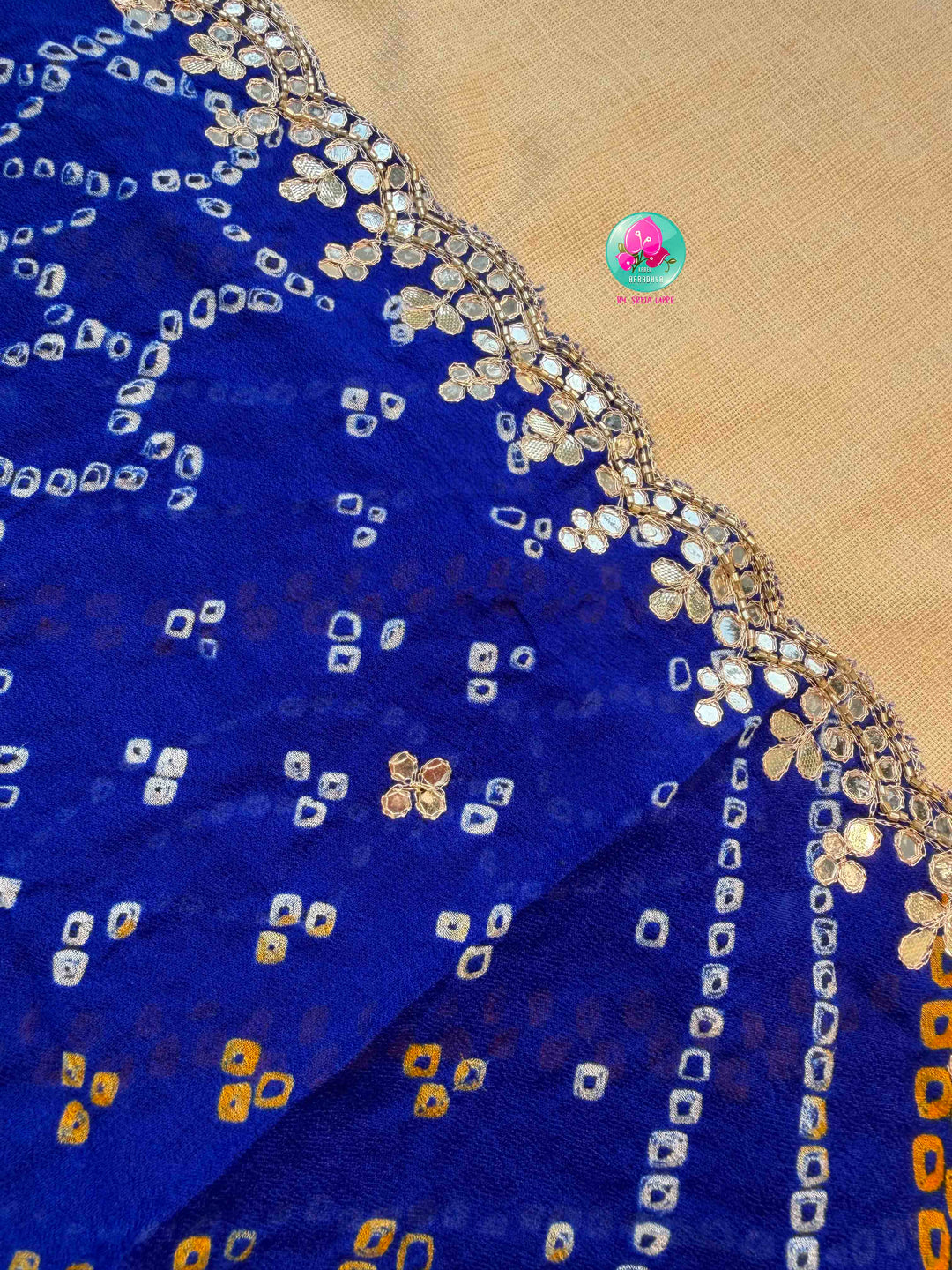 Festive Splendor & Royal Indigo: Pure Georgette Handmade Bandhani Saree with Gota Patti & Hand-Embroidered Off-White Blouse