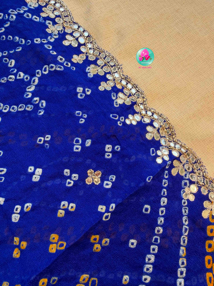 Festive Splendor & Royal Indigo: Pure Georgette Handmade Bandhani Saree with Gota Patti & Hand-Embroidered Off-White Blouse