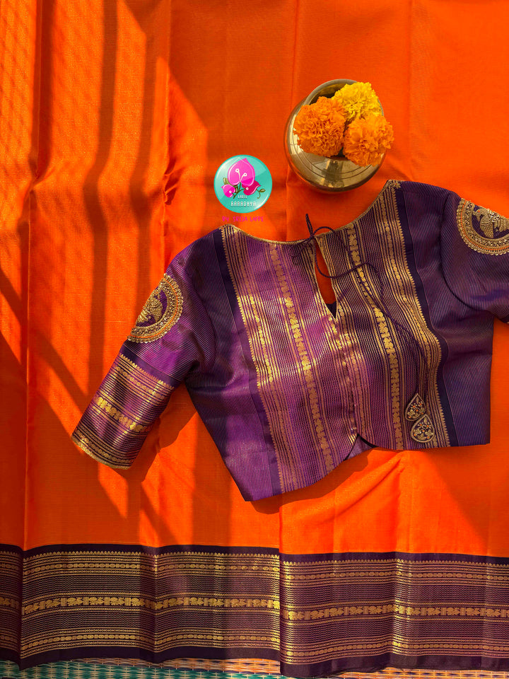 Saffron Sun & Imperial Amethyst: Orange Vaira Oosi Kanchipattu saree with Vintage Majesty