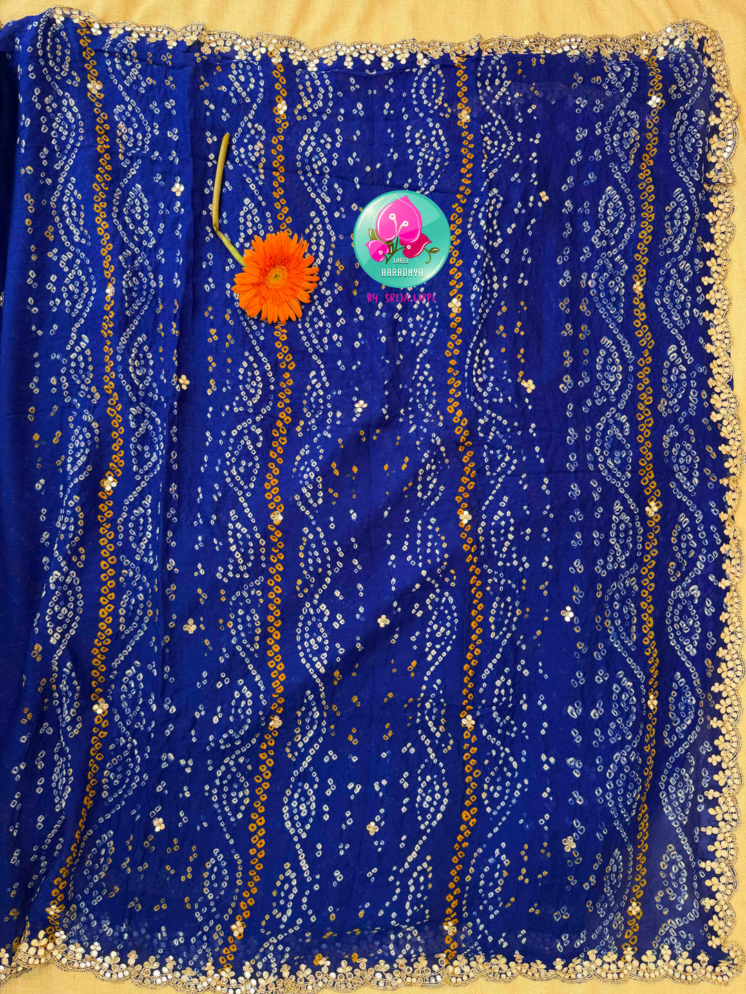 Festive Splendor & Royal Indigo: Pure Georgette Handmade Bandhani Saree with Gota Patti & Hand-Embroidered Off-White Blouse