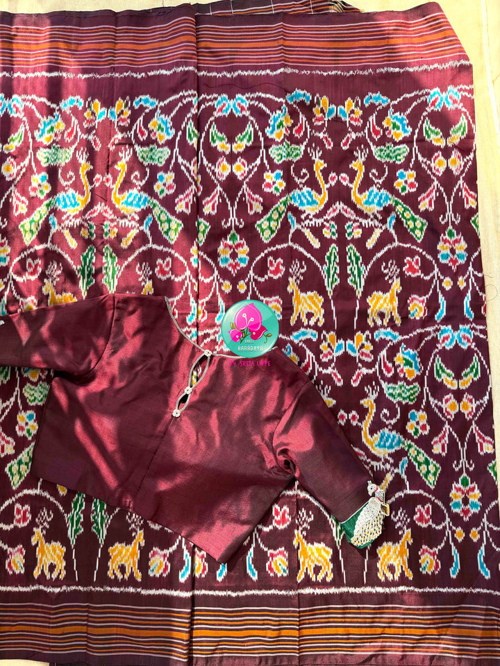 The Enchanted Forest: Pure Silk Ikkat Saree with Sovereign Peacock Artistry