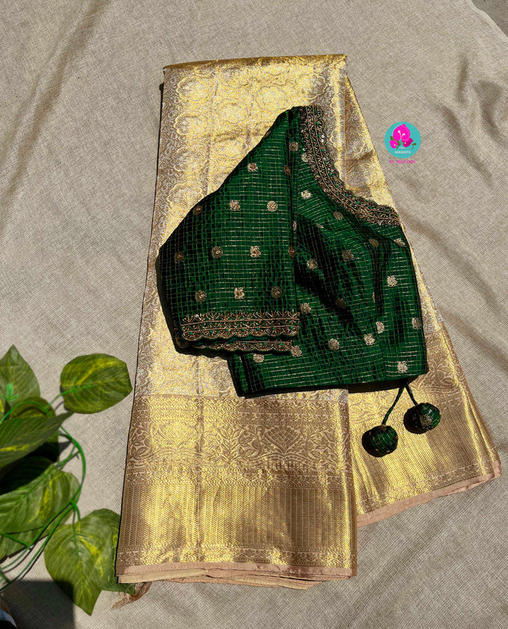 Pure Kanjeevaram silk saree paired with Maggam worked Pure silk blouse