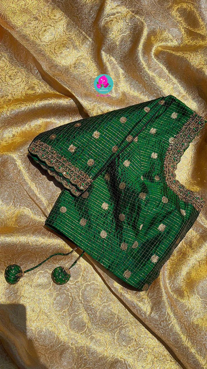 Pure Kanjeevaram silk saree paired with Maggam worked Pure silk blouse