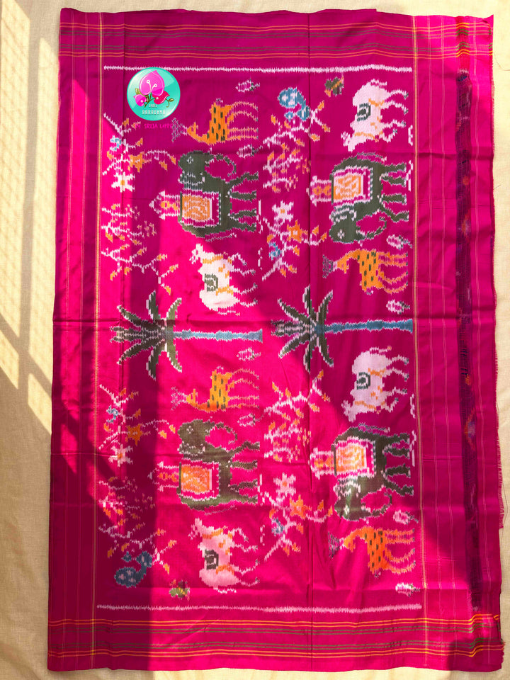 Sapphire Canopy & Sacred Echoes: Dark Blue Pure Ikkat Patola Saree with Artisan Pink Blouse