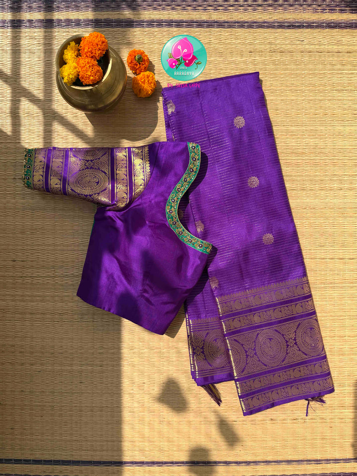 Monochromatic Imperial Majesty: Pure Royal Purple Kanjeevaram Silk Saree with Vaira Oosi Weave & Emerald-Trimmed Maggam Blouse