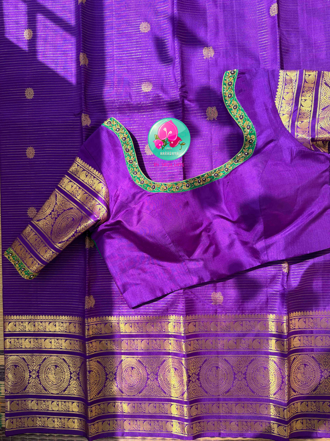 Monochromatic Imperial Majesty: Pure Royal Purple Kanjeevaram Silk Saree with Vaira Oosi Weave & Emerald-Trimmed Maggam Blouse