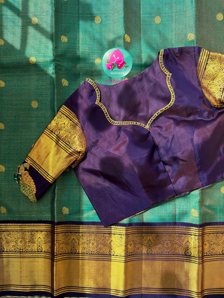 Regal Peacock Radiance & Imperial Purple Grace: Pure Peacock Green Vaira Oosi Kanjeevaram Silk Saree with Dark Purple Hand-Embroidered Blouse