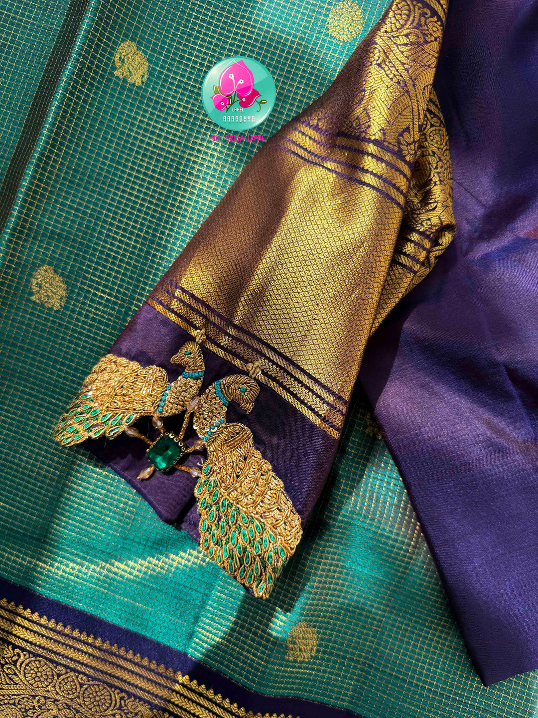 Regal Peacock Radiance & Imperial Purple Grace: Pure Peacock Green Vaira Oosi Kanjeevaram Silk Saree with Dark Purple Hand-Embroidered Blouse