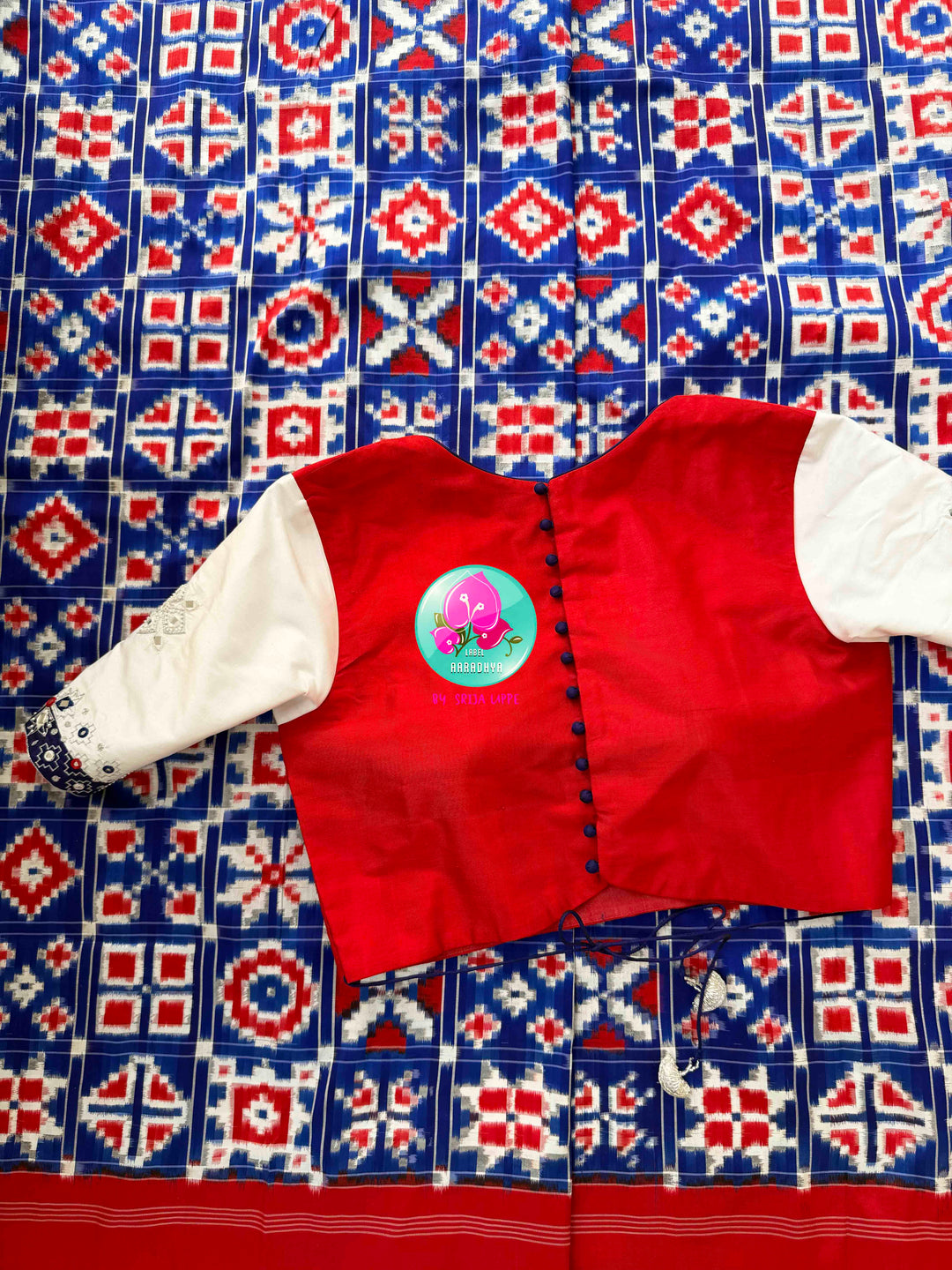 The Twelve Chronicles: Pure Telia Rumal Ikkat Saree in Red & Blue with Mirrored Silk Artistry