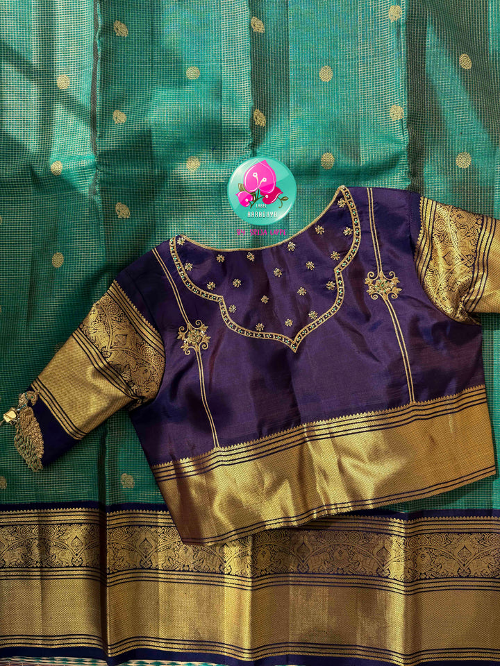 Regal Peacock Radiance & Imperial Purple Grace: Pure Peacock Green Vaira Oosi Kanjeevaram Silk Saree with Dark Purple Hand-Embroidered Blouse