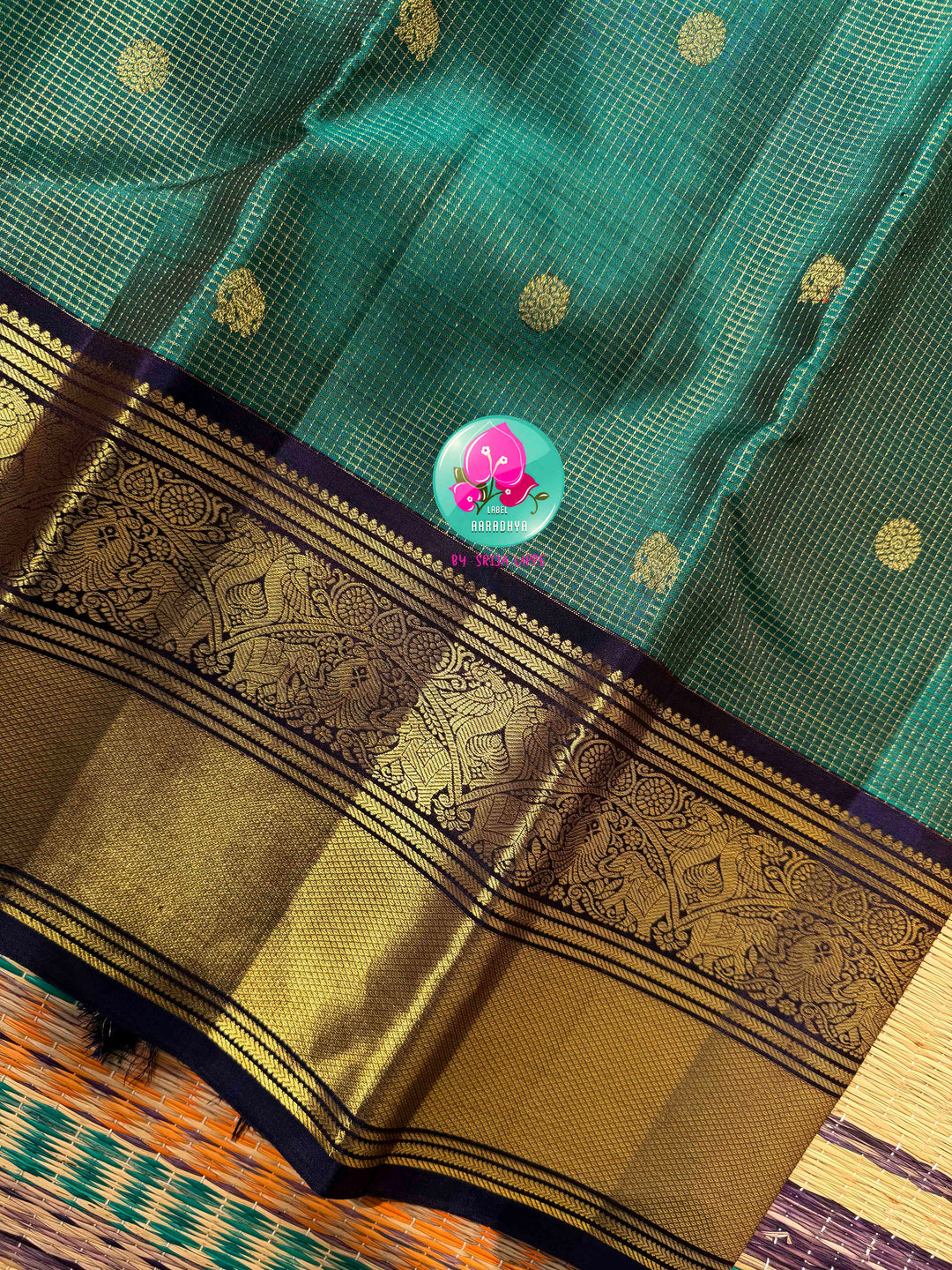 Regal Peacock Radiance & Imperial Purple Grace: Pure Peacock Green Vaira Oosi Kanjeevaram Silk Saree with Dark Purple Hand-Embroidered Blouse