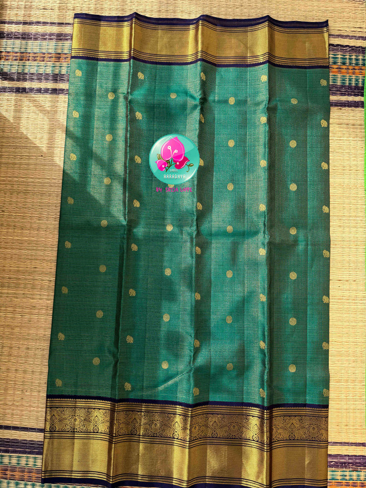 Regal Peacock Radiance & Imperial Purple Grace: Pure Peacock Green Vaira Oosi Kanjeevaram Silk Saree with Dark Purple Hand-Embroidered Blouse