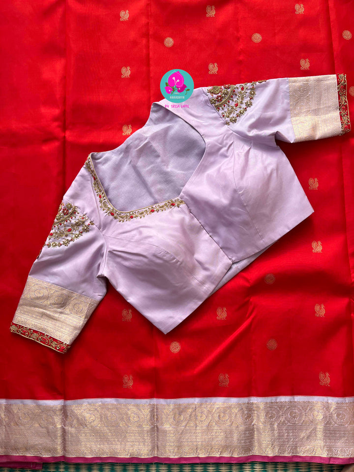 Pure Kanchipattu Red Saree with Hand embroidered Lavender blouse