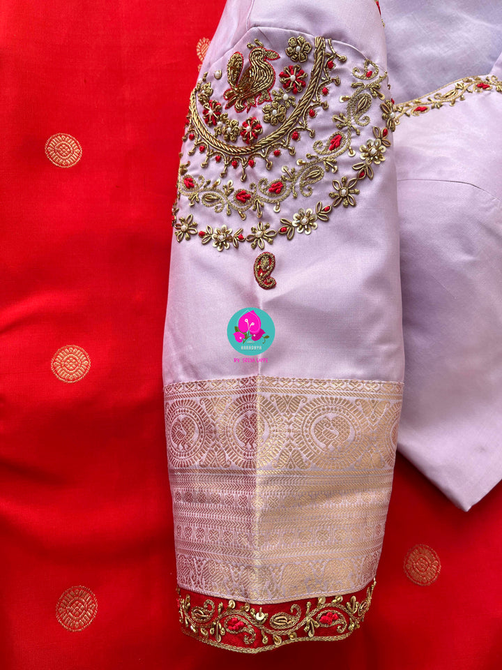Pure Kanchipattu Red Saree with Hand embroidered Lavender blouse