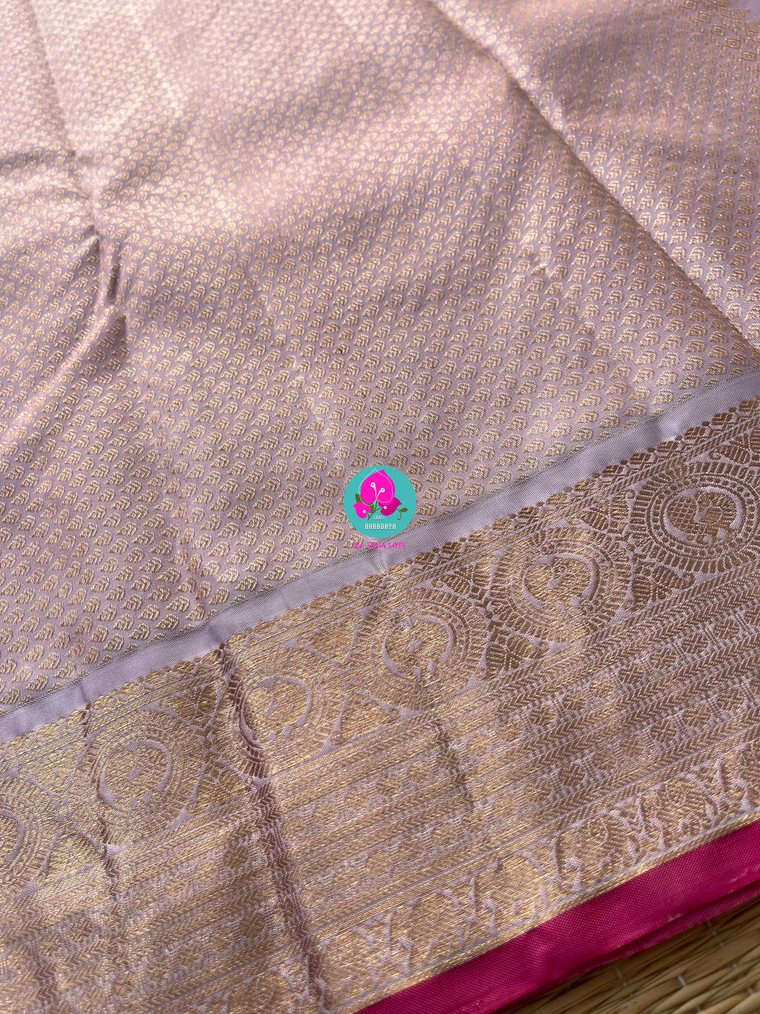 Pure Kanchipattu Red Saree with Hand embroidered Lavender blouse
