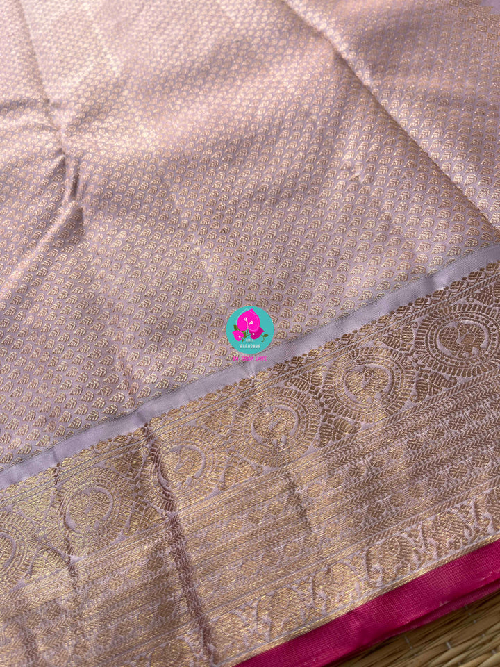 Pure Kanchipattu Red Saree with Hand embroidered Lavender blouse