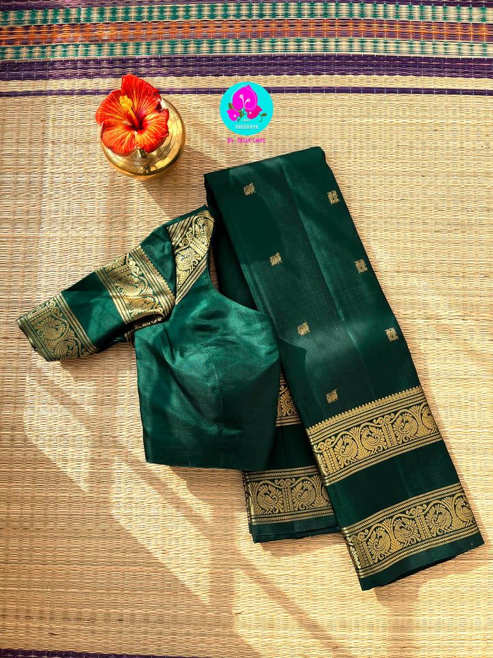 Kanchipuram 2g zari Emerald green vintage saree with gap border and blouse