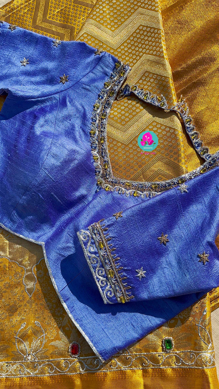 Pure Kanjeevaram silk saree Paired with Maggam worked Pure silk blouse