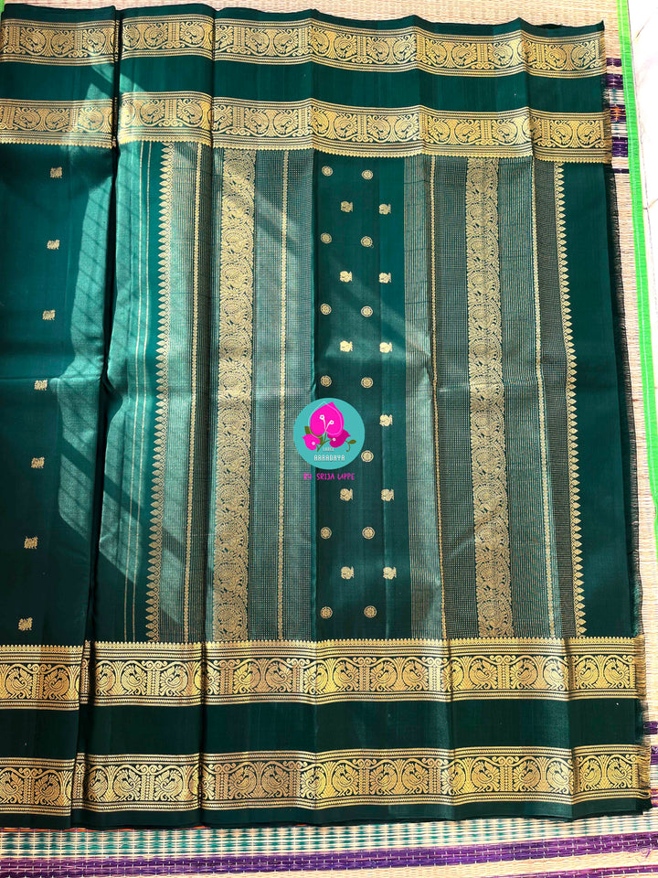 Kanchipuram 2g zari Emerald green vintage saree with gap border and blouse