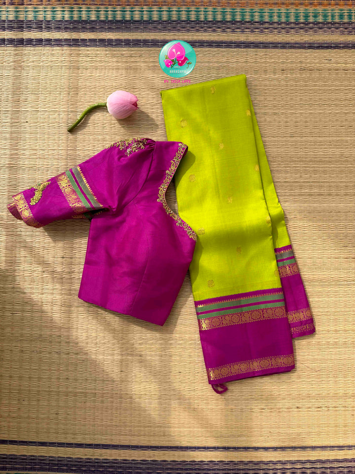 Vibrant Parrot Green Radiance & Rani Pink Magnificence: Pure Kanjeevaram Silk Saree with Peacock-Themed Hand-Embroidered Maggam Blouse