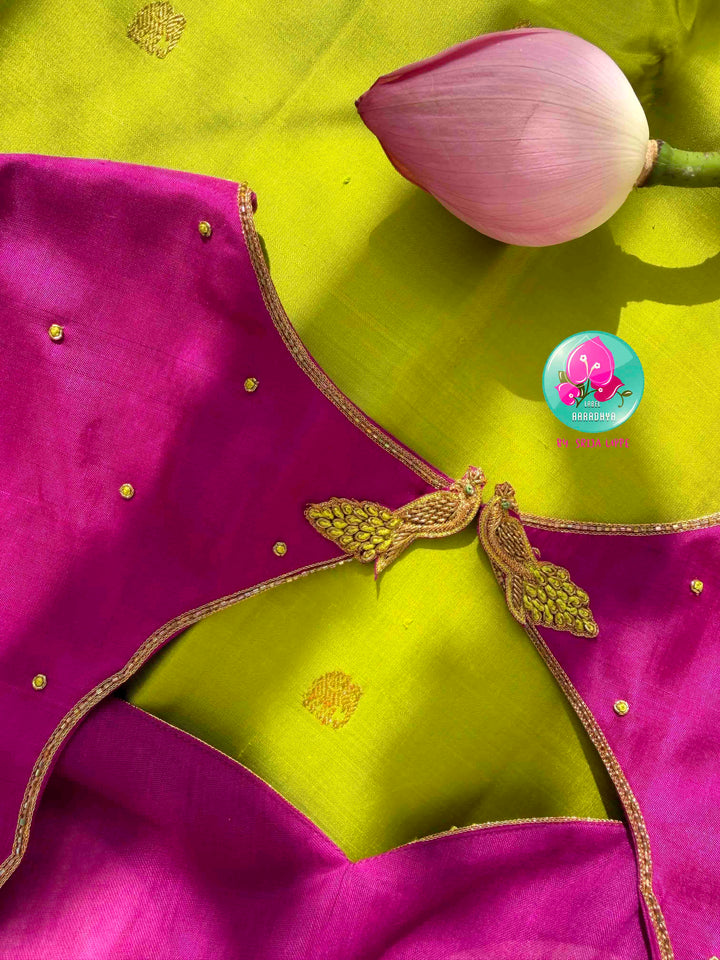 Vibrant Parrot Green Radiance & Rani Pink Magnificence: Pure Kanjeevaram Silk Saree with Peacock-Themed Hand-Embroidered Maggam Blouse