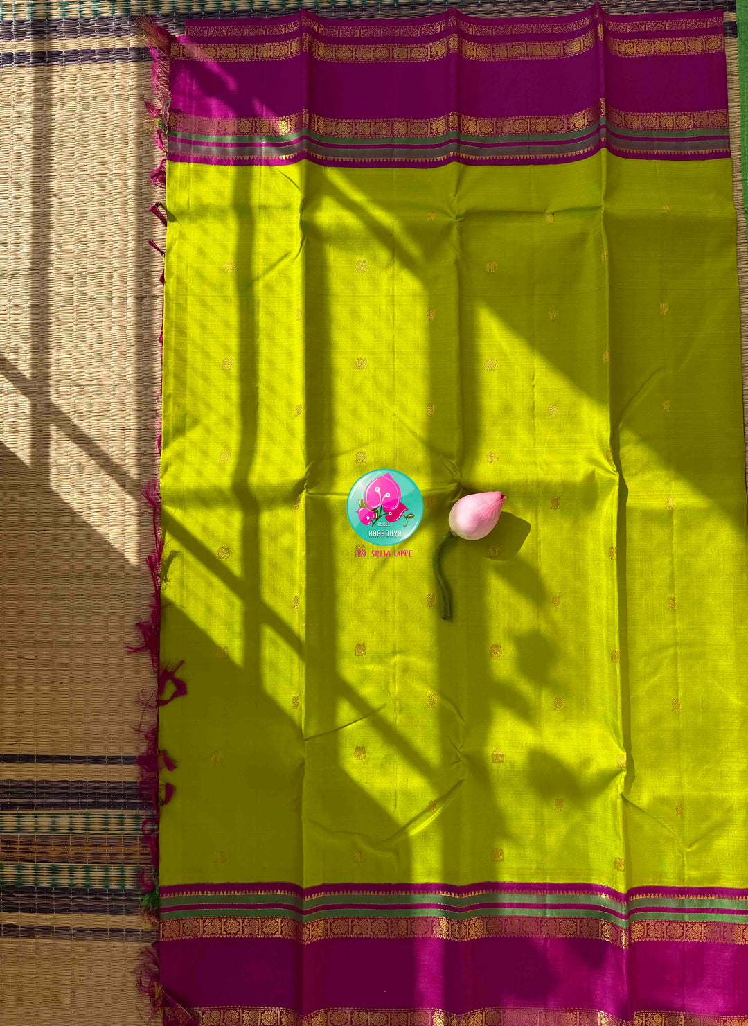 Vibrant Parrot Green Radiance & Rani Pink Magnificence: Pure Kanjeevaram Silk Saree with Peacock-Themed Hand-Embroidered Maggam Blouse