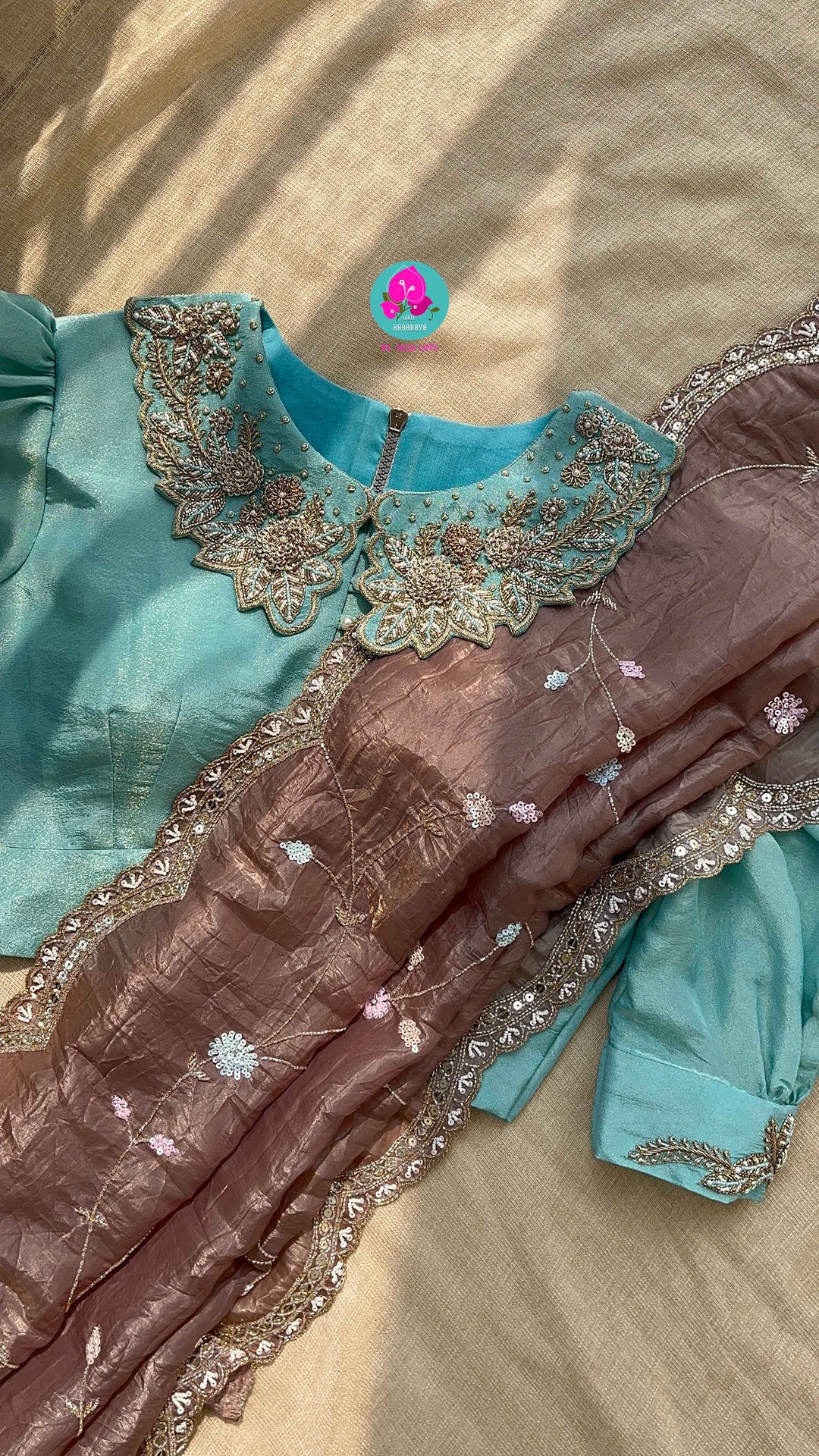Hand embroidered soft crush organza saree paired with hand embroidered Blouse