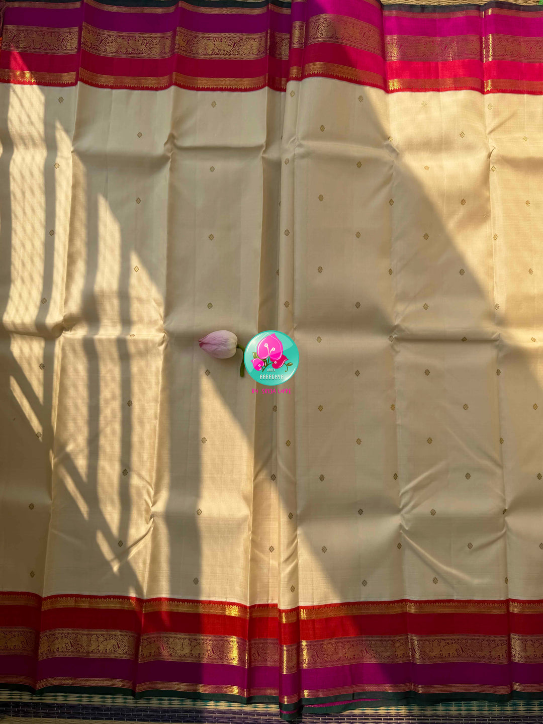 The Celestial Heirloom: Serene Off-White Kanjivaram Saree with Surya-Chandrulu Artistry