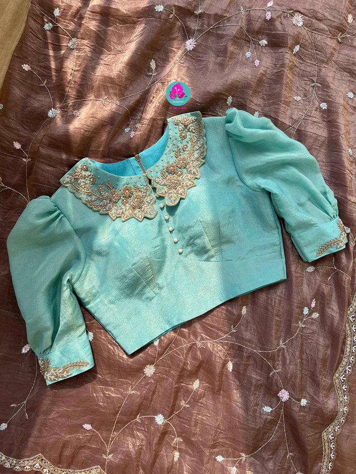 Hand embroidered soft crush organza saree paired with hand embroidered Blouse