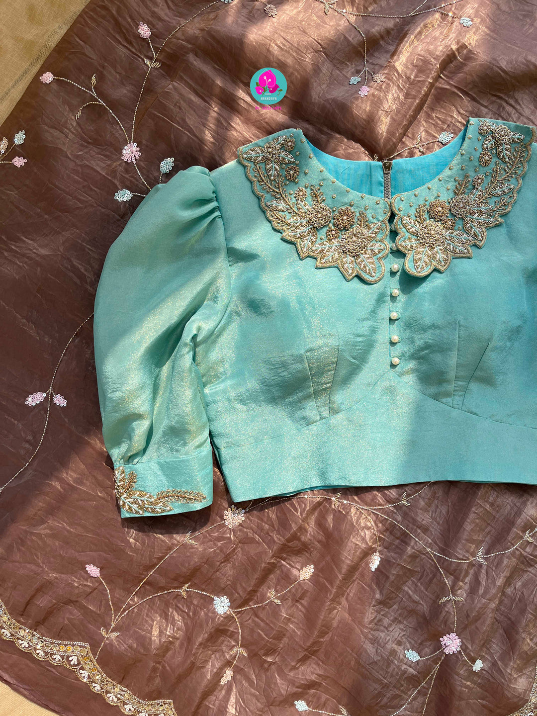 Hand embroidered soft crush organza saree paired with hand embroidered Blouse