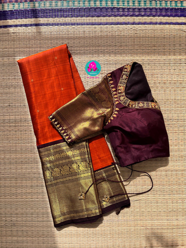 Pure Kanchipattu saree in vintage rust orange and brown border with hand embroidered blouse
