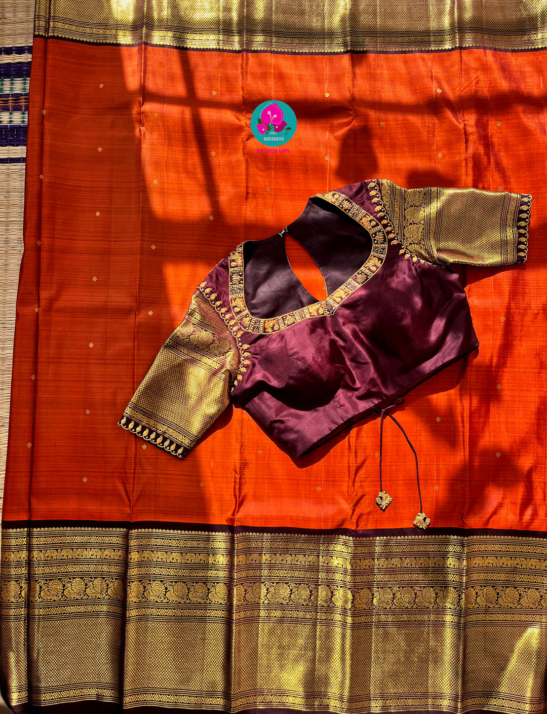 Pure Kanchipattu saree in vintage rust orange and brown border with hand embroidered blouse