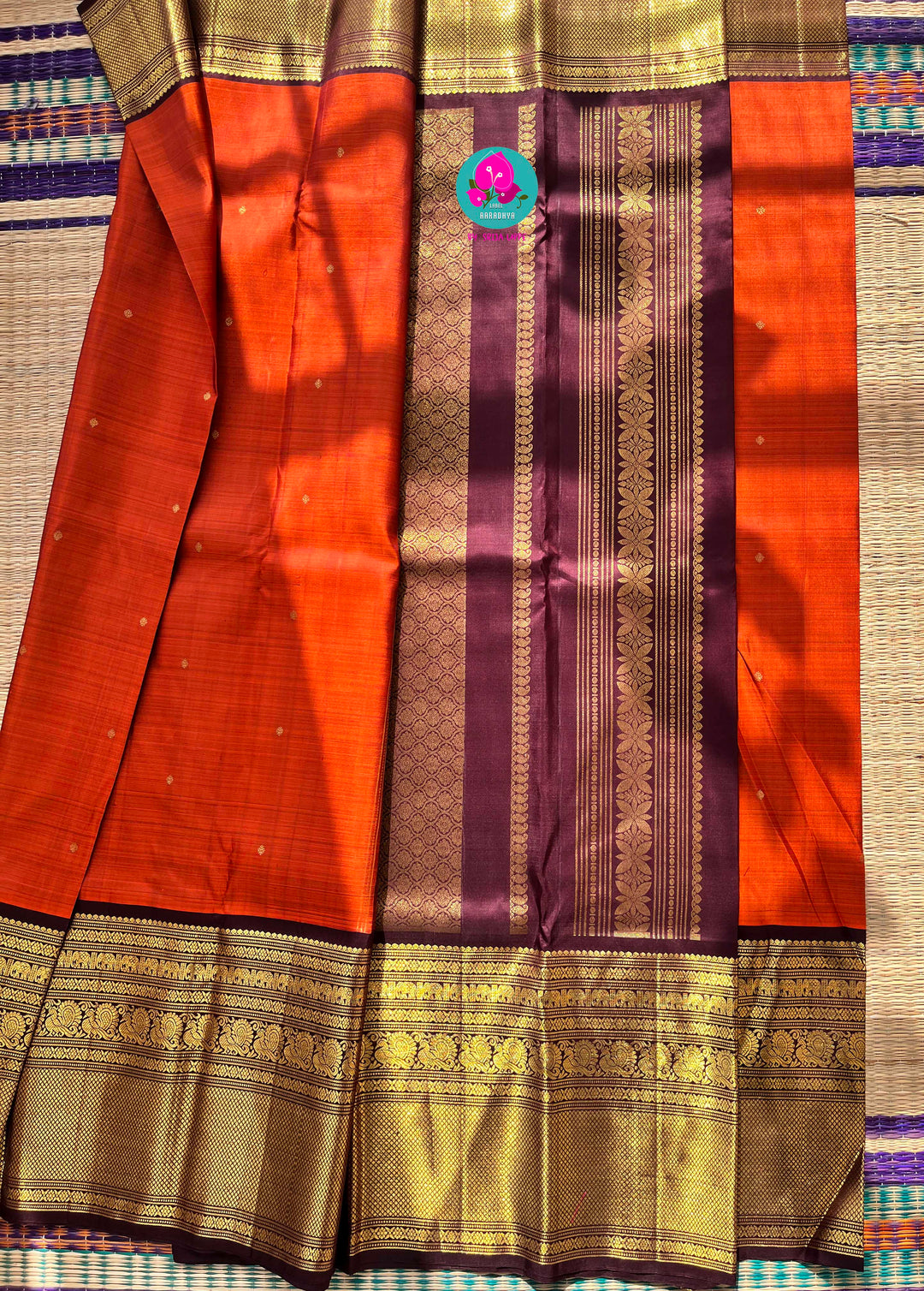 Pure Kanchipattu saree in vintage rust orange and brown border with hand embroidered blouse