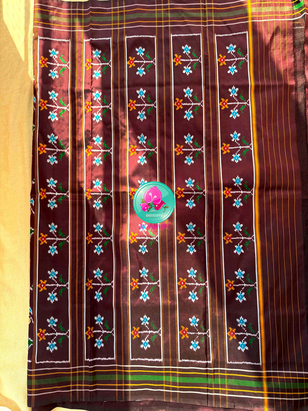 Sovereign Soil: Deep Brown Double Ikkat Saree with Forest Green Madhubala Grace Blouse