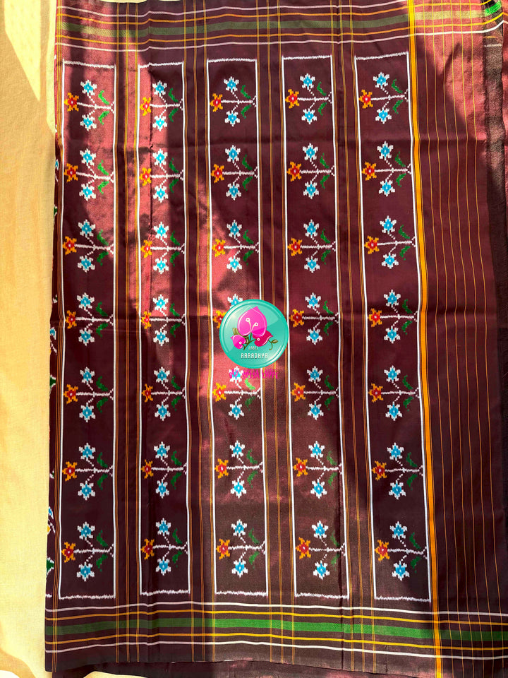 Sovereign Soil: Deep Brown Double Ikkat Saree with Forest Green Madhubala Grace Blouse