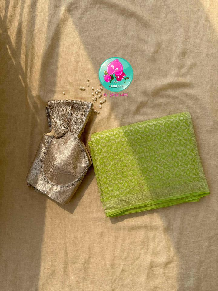 Verdant Radiance: Parrot Green Banarasi Khaddi Georgette Saree with Nandhini Grace with hand embroidered blouse