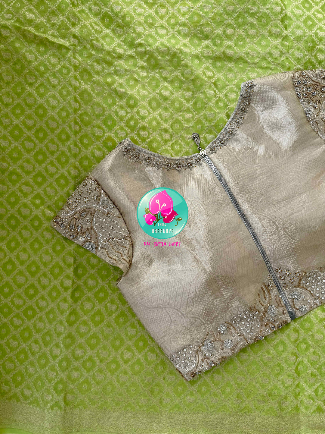 Verdant Radiance: Parrot Green Banarasi Khaddi Georgette Saree with Nandhini Grace with hand embroidered blouse