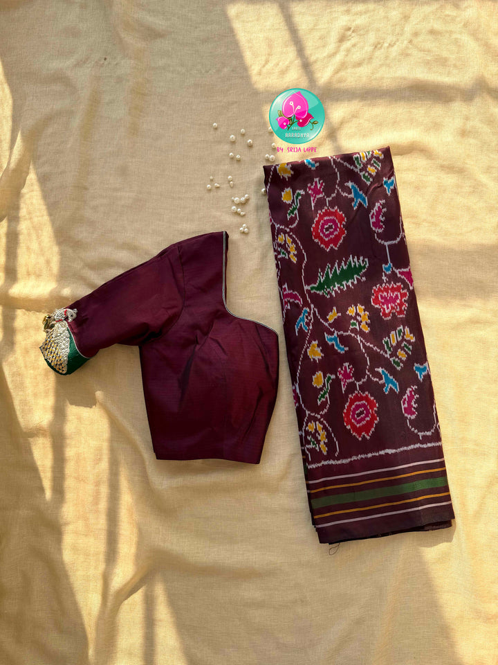 The Enchanted Forest: Pure Silk double Ikkat weaving Saree with Sovereign Peacock Artistry