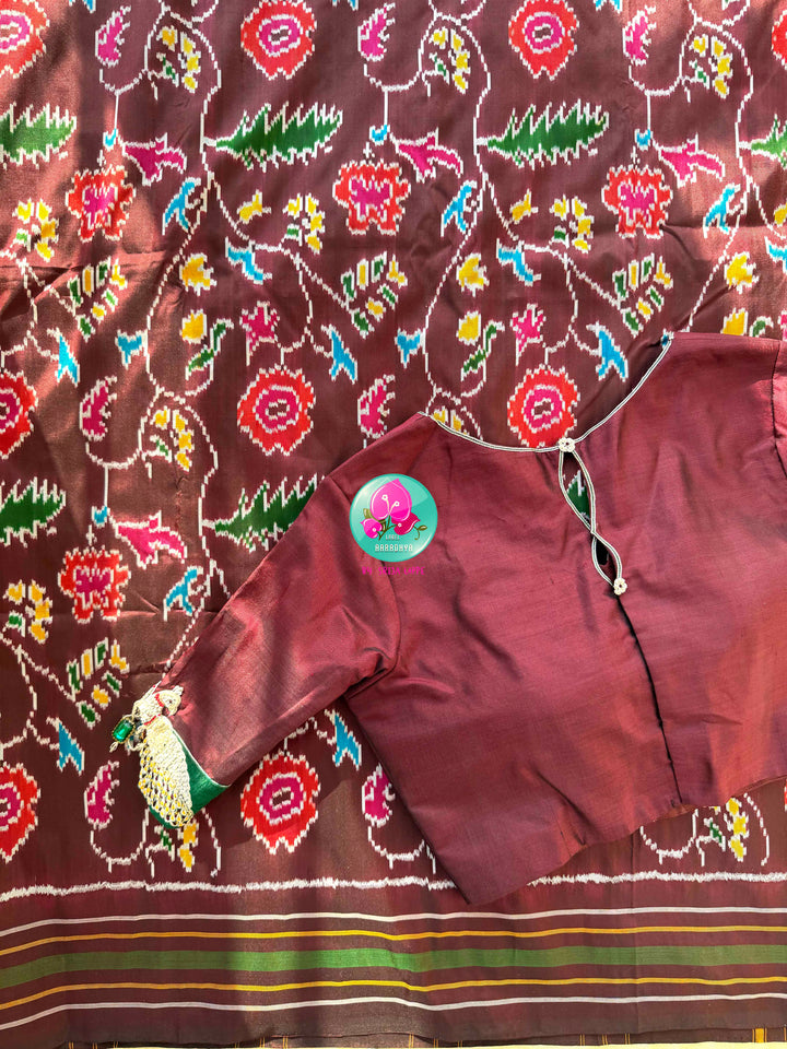 The Enchanted Forest: Pure Silk double Ikkat weaving Saree with Sovereign Peacock Artistry