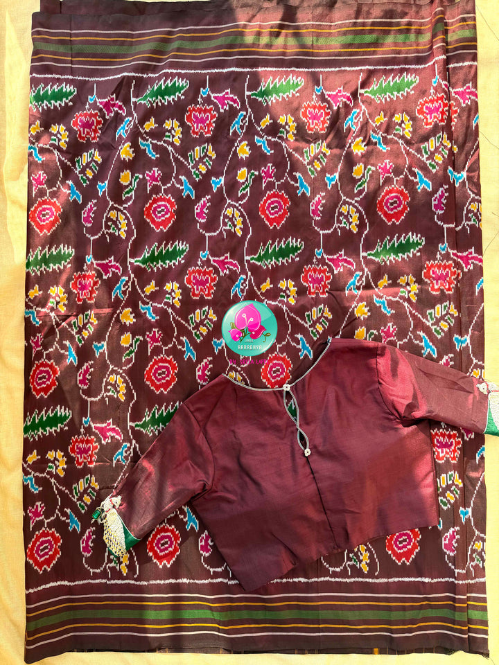 The Enchanted Forest: Pure Silk double Ikkat weaving Saree with Sovereign Peacock Artistry