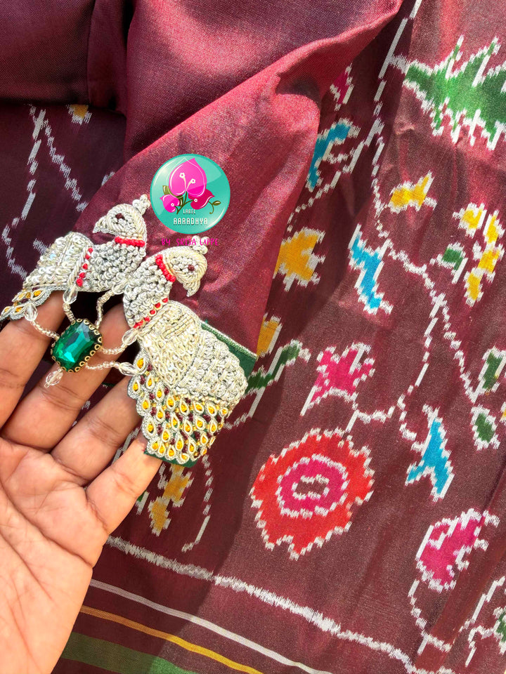 The Enchanted Forest: Pure Silk double Ikkat weaving Saree with Sovereign Peacock Artistry