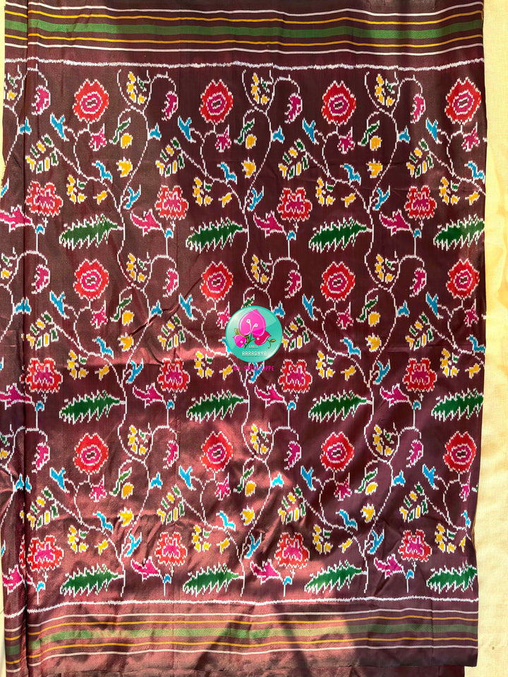 The Enchanted Forest: Pure Silk double Ikkat weaving Saree with Sovereign Peacock Artistry