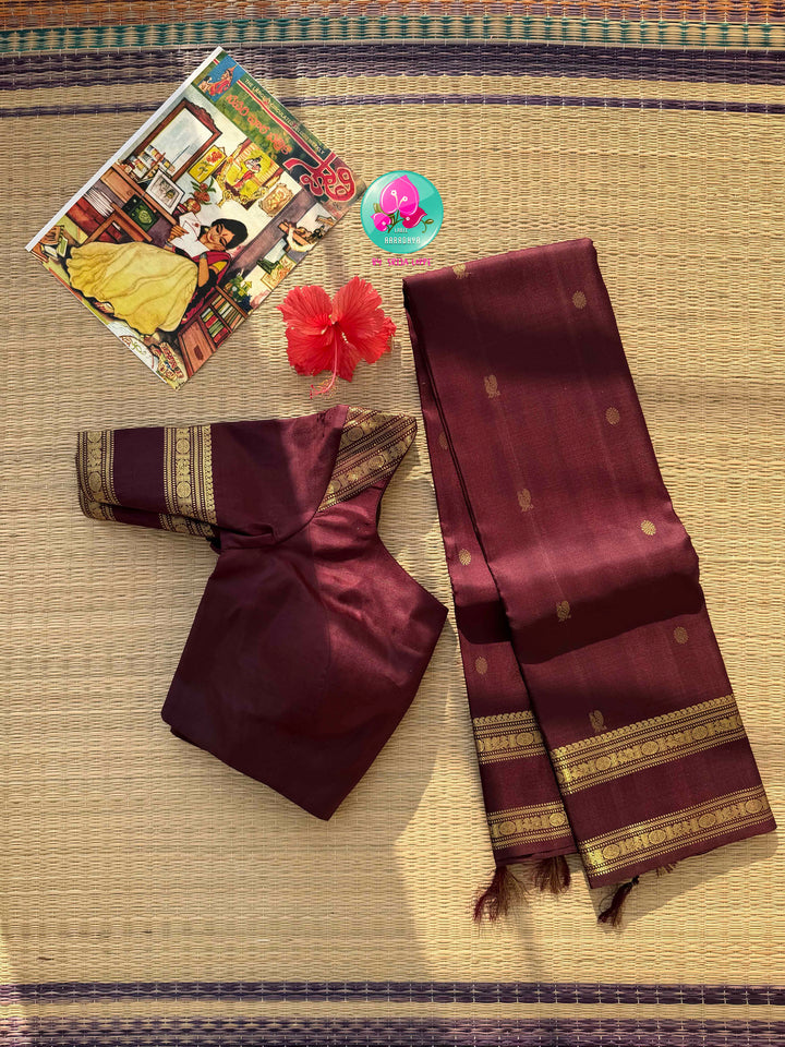 The Sovereign Guardian: Vintage Cocoa Kanchipuram Saree with Gandaberunda Majesty