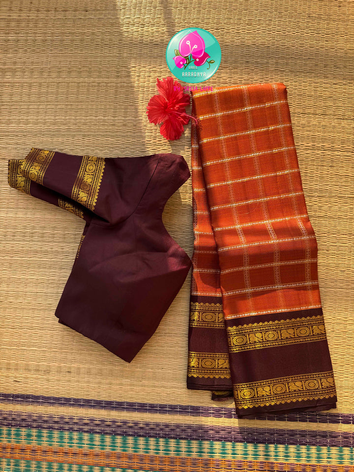 Sovereign Earth: Rust Orange & Dark Brown Kanchipattu Saree with Gandaberunda Artistry